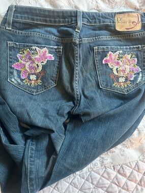 Blue Boot Cut Jeans with Embroidered Floral Pockets